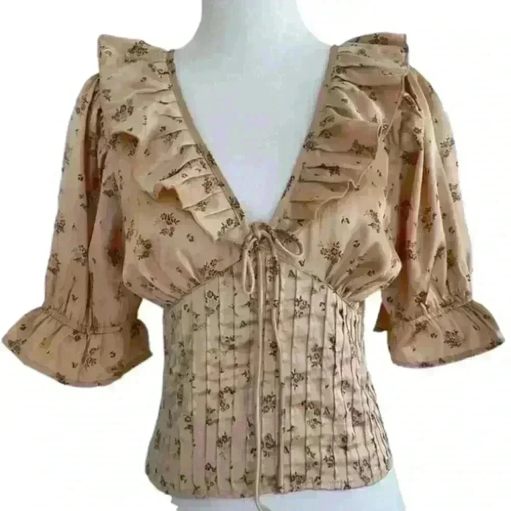 FREE PEOPLE Isabella Silky Floral Ruffle Babydoll Blouse in Copper‎ color